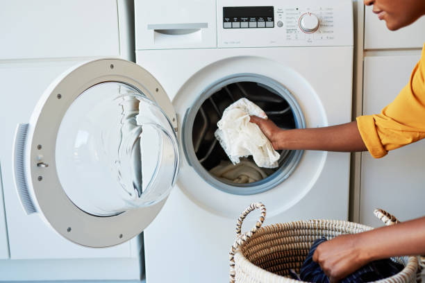 Bonita Appliance Woes? Here's How to Choose the Right Repair Service 3 Cropped shot of an unrecognizable woman doing her laundry at home
